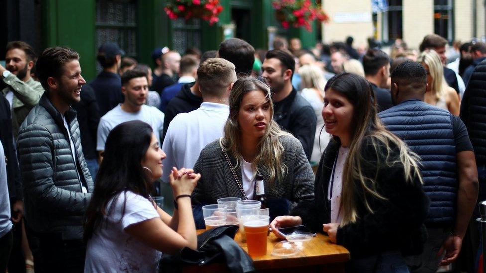 Drinkers at a pub in Borough Market