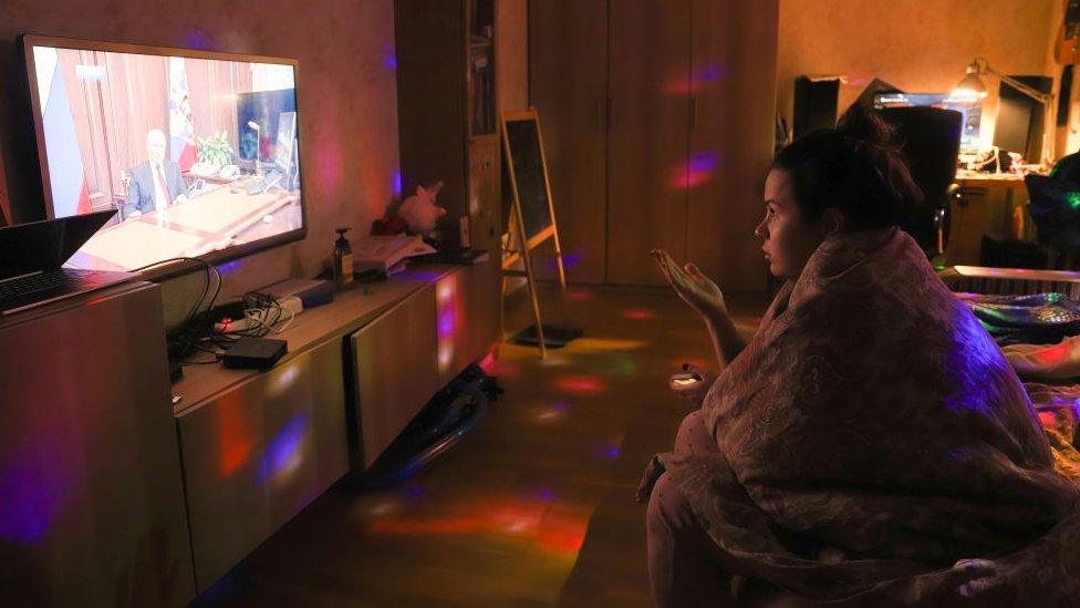 woman-watching-TV-in-Russia.