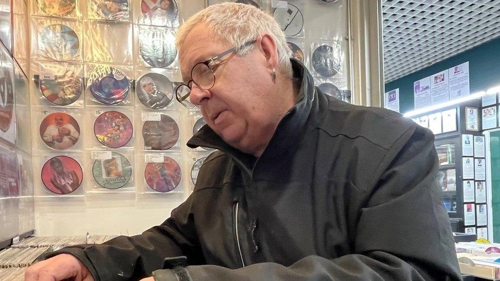 Music lover Tim Laws searches for an LP at Spin-It Records in Hull