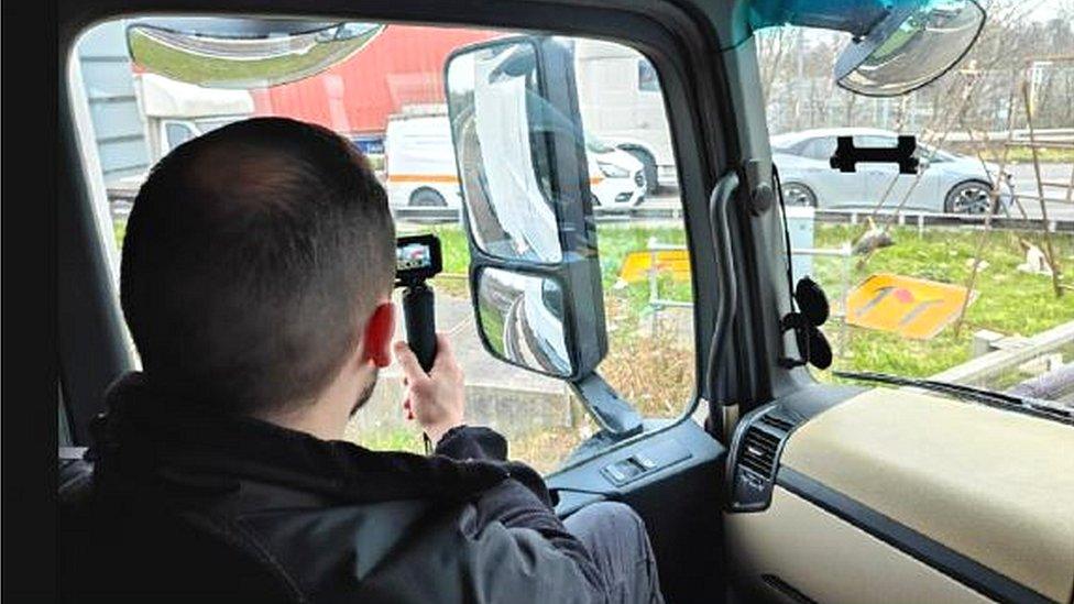 Inside unmarked police lorry