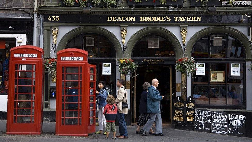 Two red phone boxes on Edinburgh's Royal Mile.