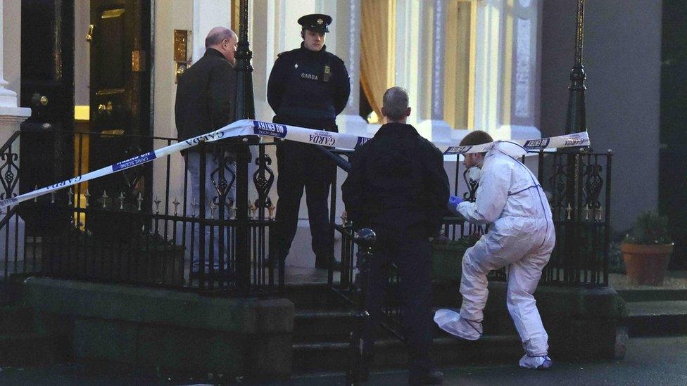 Police and forensic officers at the scene of the shooting at Dublin's Regency Hotel