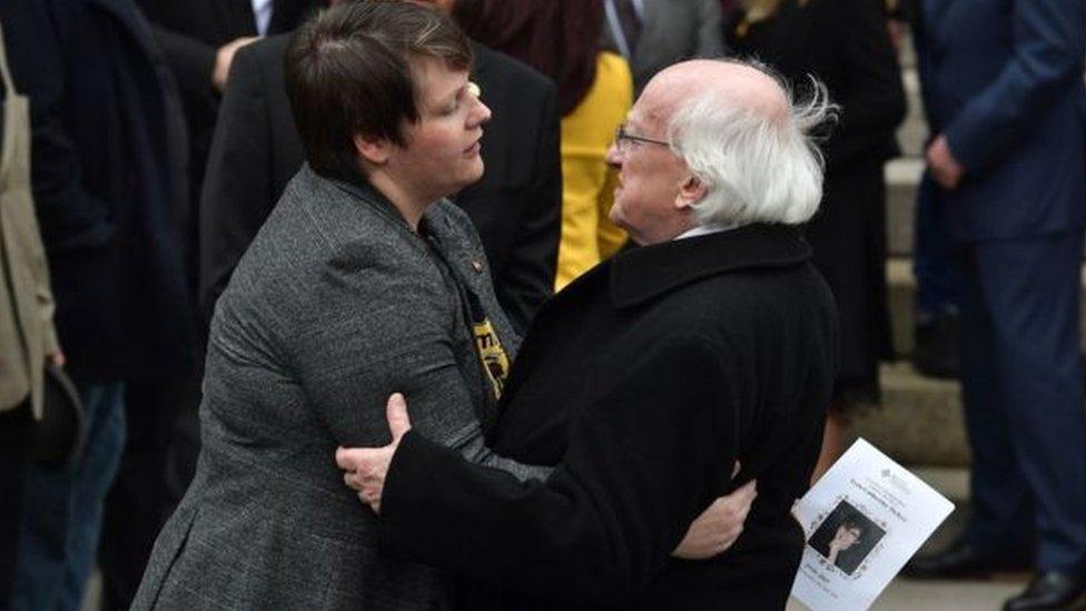 Irish President Michael D Higgins consoles Ms McKee's partner Sara Canning