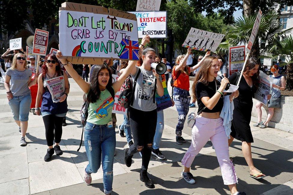 Women, from a number of different protest groups, take part in an anti-Trump demonstration in central London