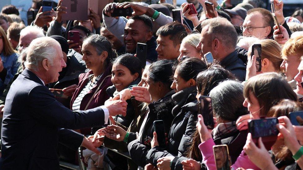 King Charles meets people in the queue