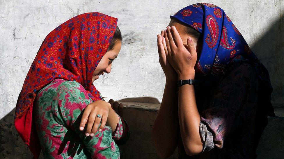 Two girls laughing in the village of Turtuk in Baltistan, Ladakh, Jammu and Kashmir, India.