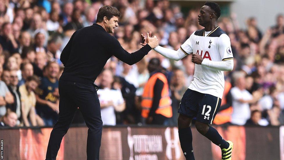 Mauricio Pochettino and Victor Wanyama clasp hands on the Tottenham touchline