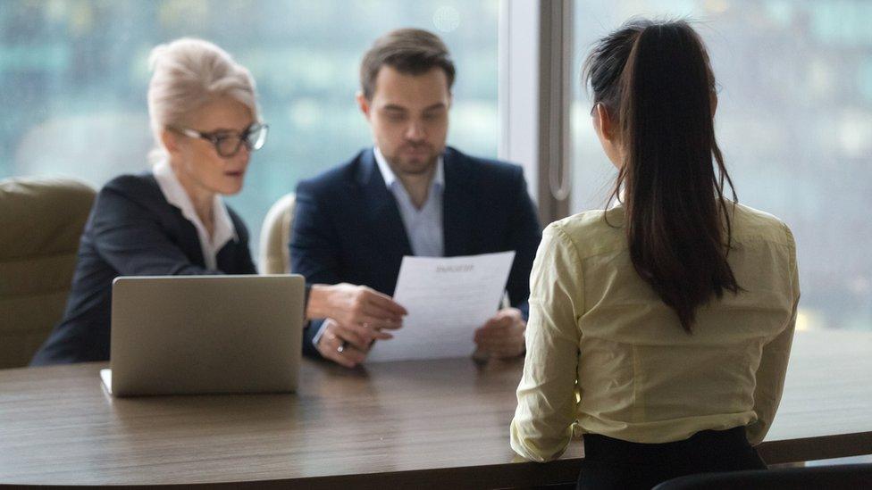 Woman with HR managers