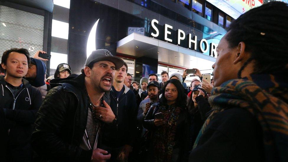 Donald Trump supporters and Hillary Clinton supporters clash outside in Times Square after Republican presidential nominee Donald Trump was declared the winner of the U.S. presidential election