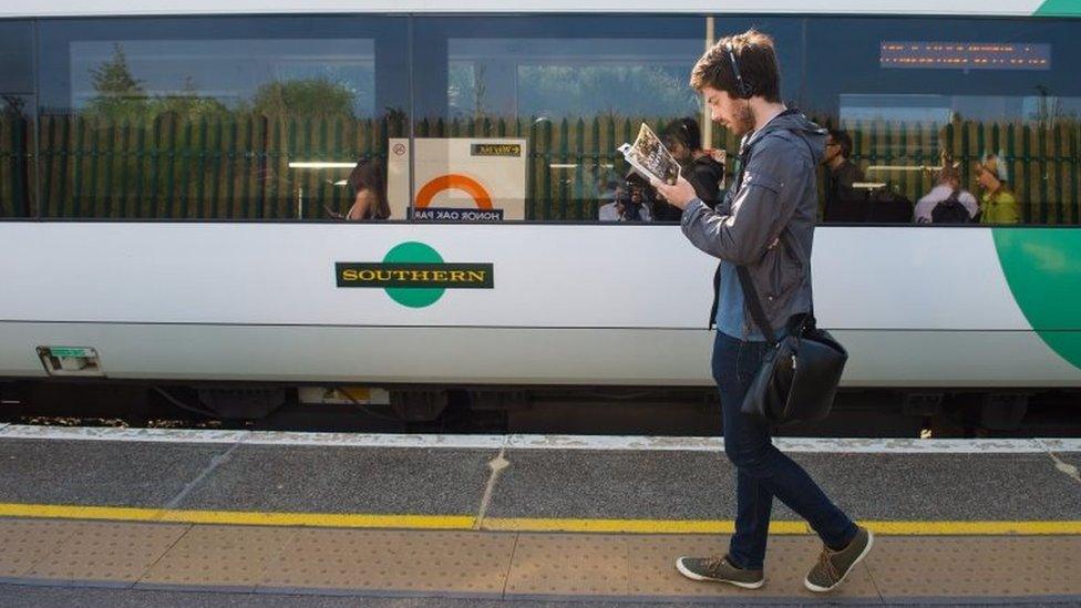 Man beside Southern train