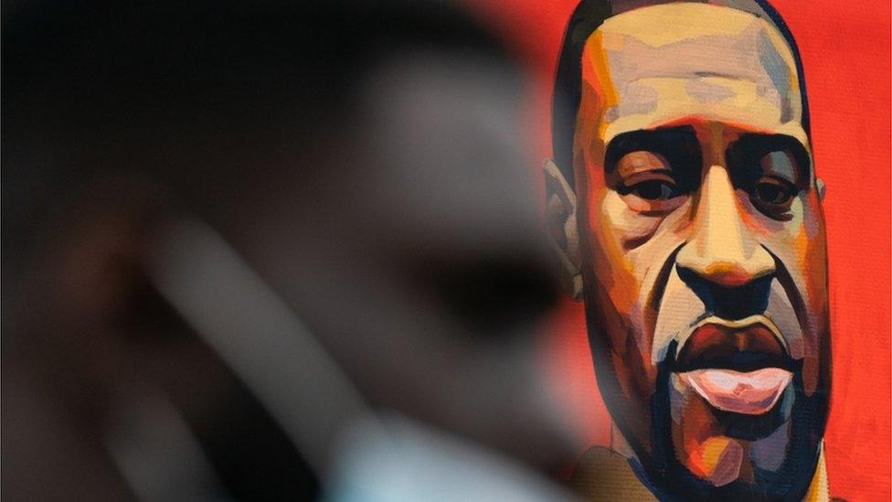 A portrait of George Floyd is seen during a Black Lives Matter protest on June 17, 2020 in the Manhattan borough of New York City