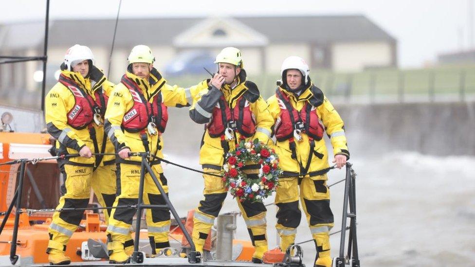 RNLI crew with wreath