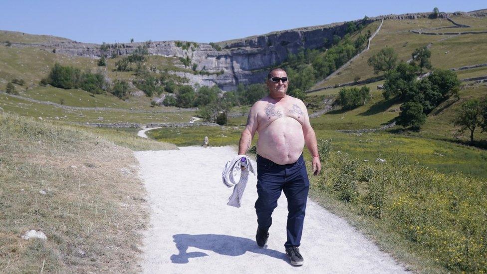 Man walks at Malham