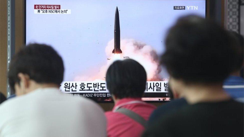 South Korean people watch breaking news of North Korea"s missile launch, at Seoul Station in Seoul, South Korea, 25 July 2019