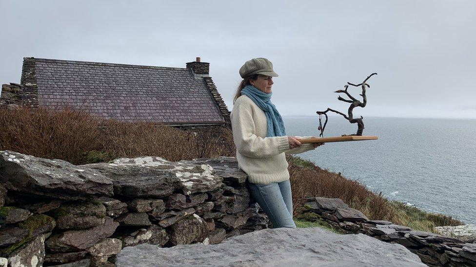 Artist Geraldine van Heemstra letting the wind make art on the coast of Country Kerry