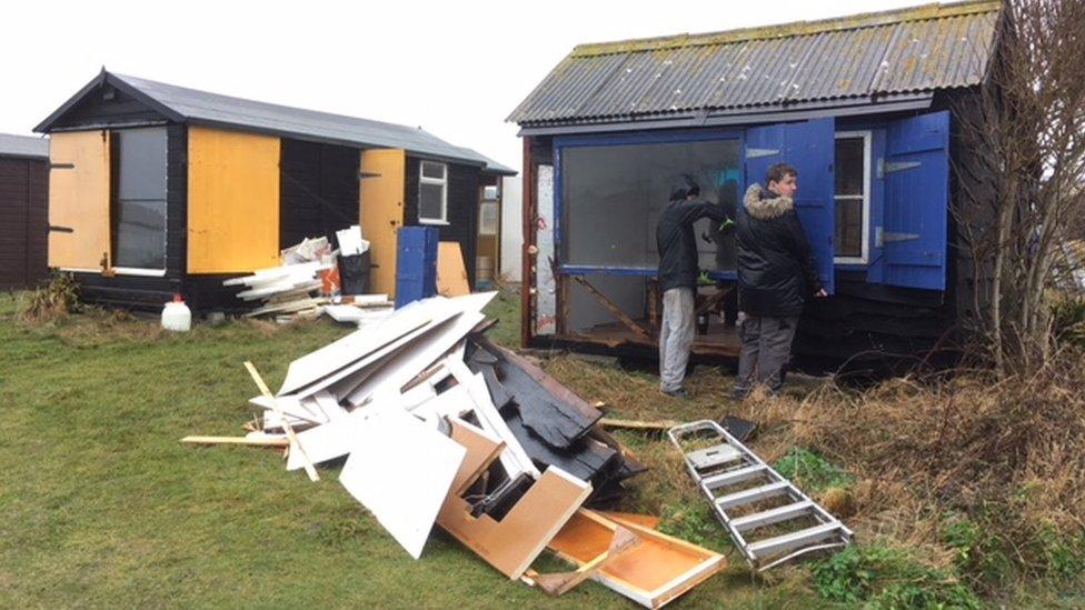 demolished beach hut