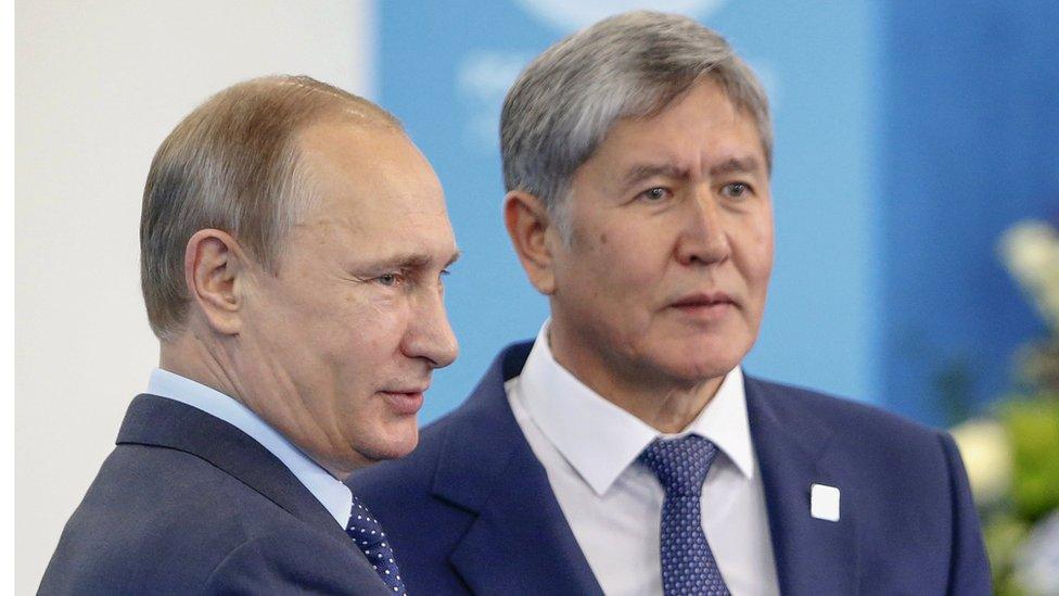 Kyrgyz President Almazbek Atambayev with his Russian counterpart Vladimir Putin at a regional summit. Kyrgyzstan has joined the Russian led regional customs union.