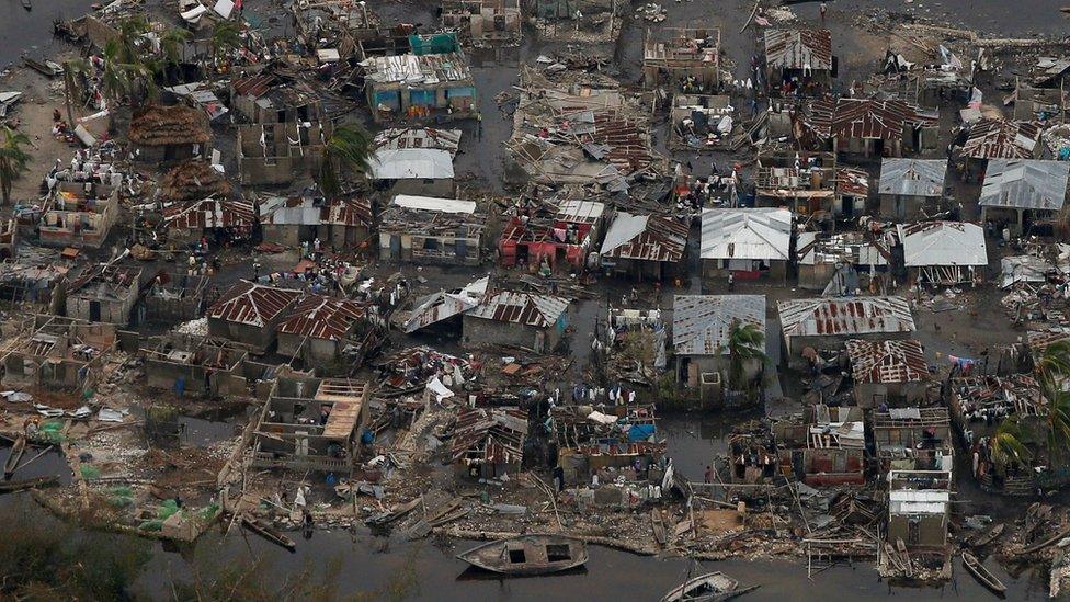 Destroyed houses are seen in a village after Hurricane Matthew passes Corail in Haiti