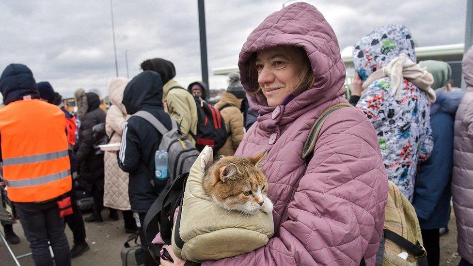 War refugees from Ukraine at the Ukrainian-Polish border crossing point Krakowiec-Korczowa