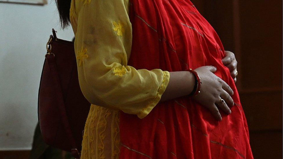 A pregnant Indian woman