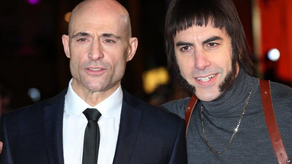 Mark Strong and Sacha Baron Cohen as Nobby