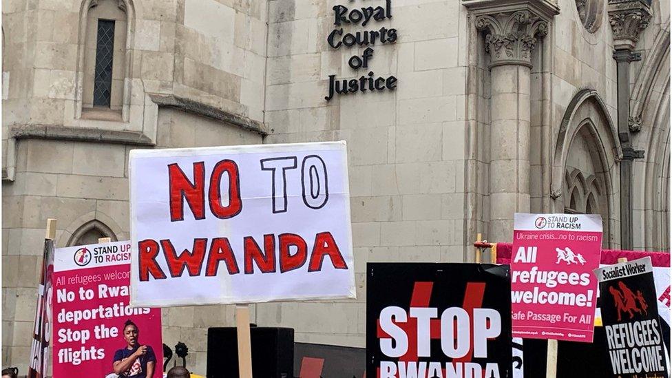 Demonstrators outside the Royal Courts of Justice, central London, protesting against the Government's plan to send some asylum seekers to Rwanda.