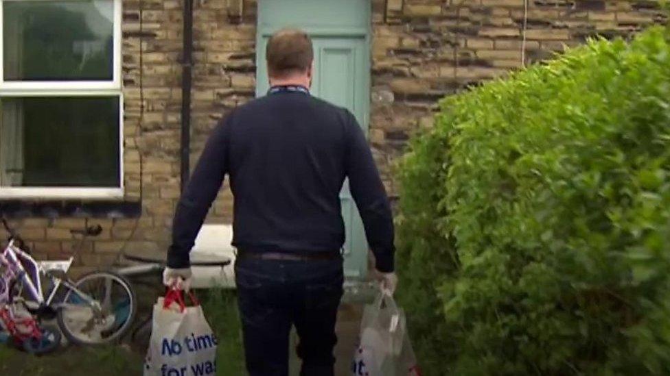 head teacher delivering food