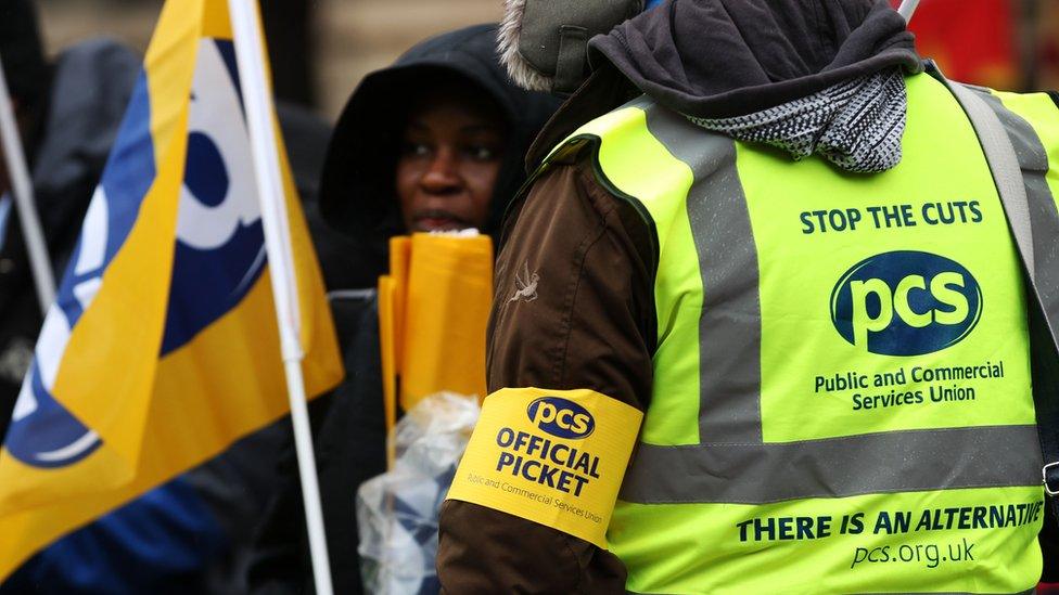 A union member wearing an arm band on a picket line