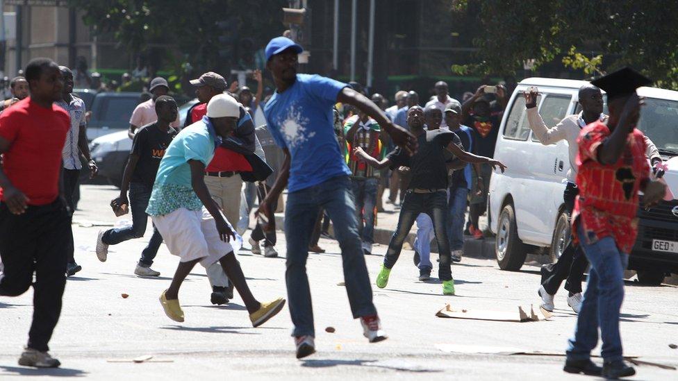 Protesters hurling stones at police in Harare, Zimbabwe - Wednesday 3 August 2016