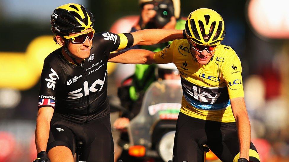 Geraint Thomas crosses the Tour de France finish line with winner and Team Sky leader Chris Froome