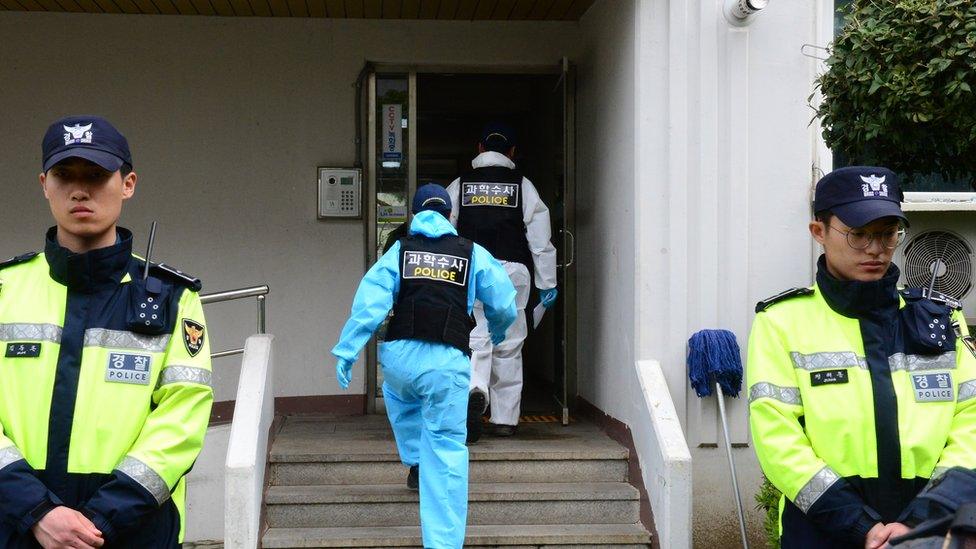 Police outside the apartment