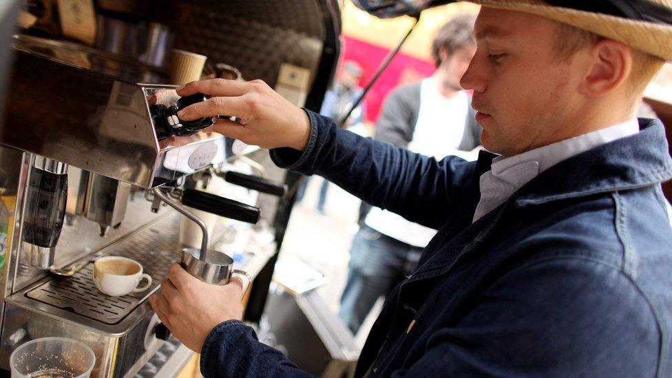 Barista making coffee