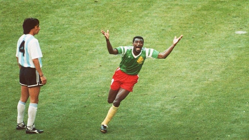 F Biyik of Cameroon celebrate after scoring against Argentina during the 1990 football World Cup in Italy