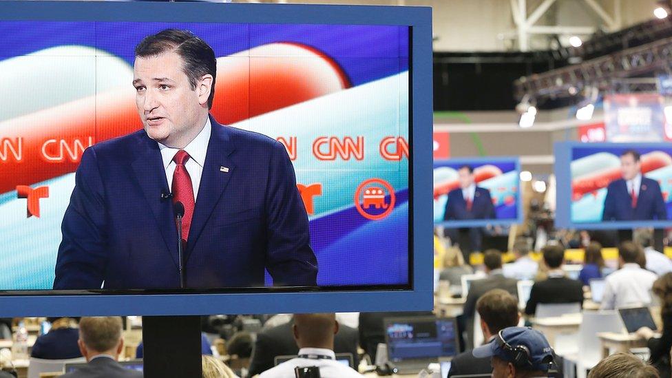 US Republican Presidential Candidate Ted Cruz is seen on television in the CNN filing room during the Republican Presidential Debate at the University of Houston in Houston, Texas on February 25, 2016.