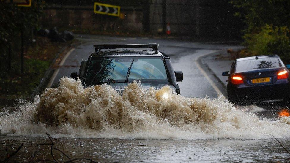 cars-driving-through-floods.