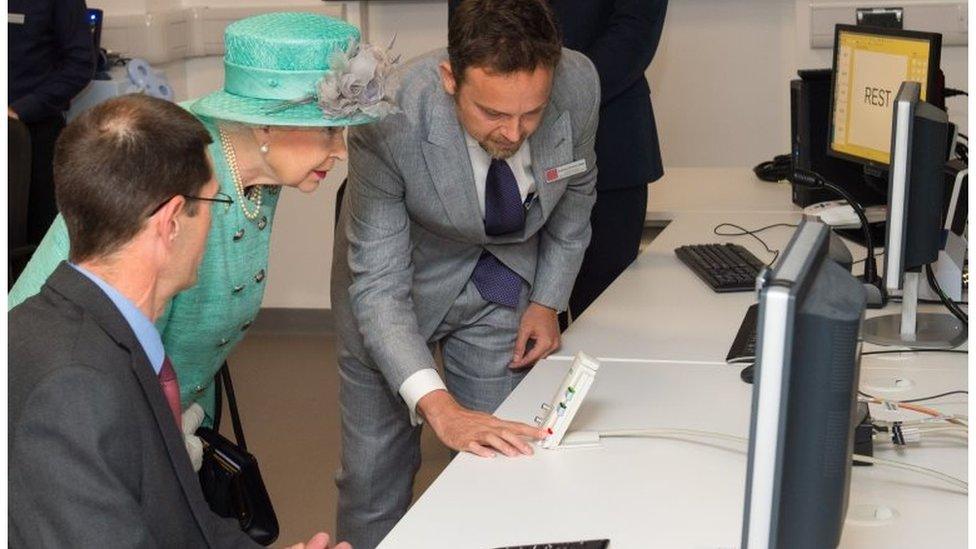 The Queen uses an intercom to speak to a patient in a scanner