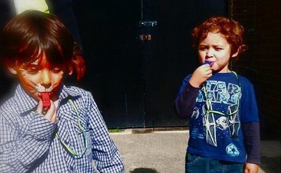 Children with whistles at Notting Hill Carnival