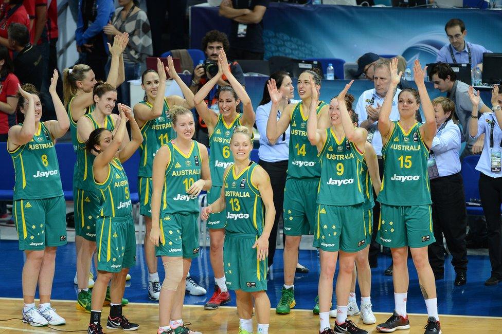 Australia's players celebrate their win against Turkey in the 2014 FIBA Women's World Championships 3rd place basketball match at Fenerbahce Ulker Sports Arena on 5 October 2014 in Istanbul