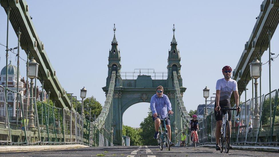 Cyclists on Hammersmith Bridge