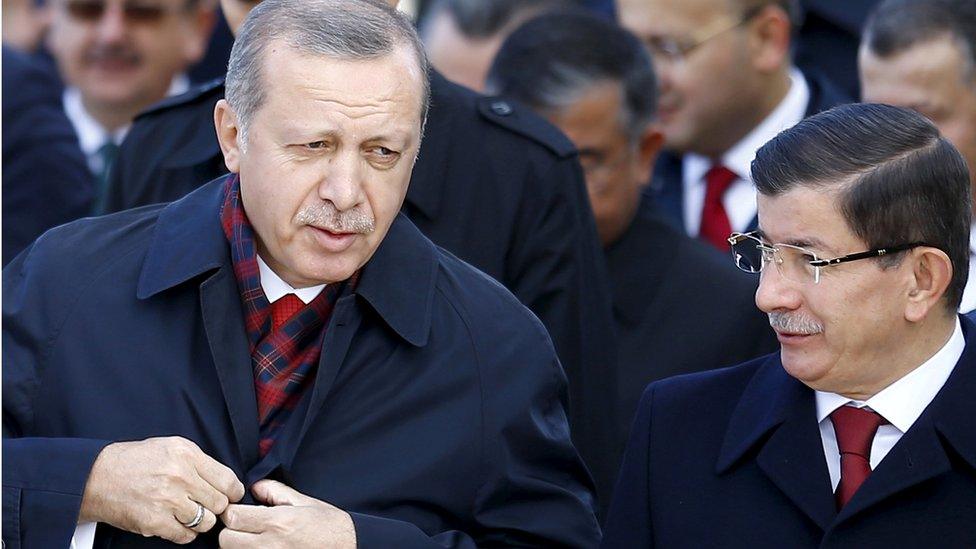 Recep Tayyip Erdogan (L) with Ahmet Davutoglu (R) (file pic)