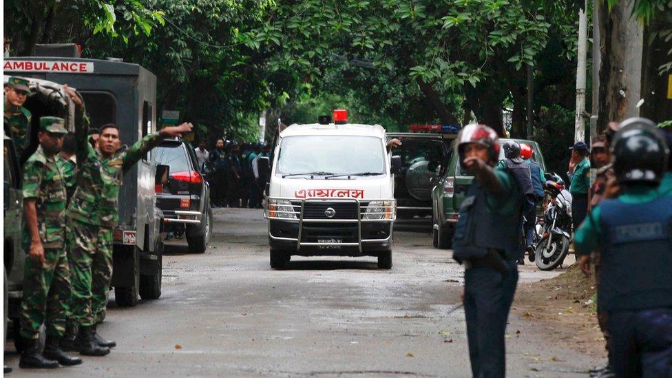 An ambulance transports bodies found at a restaurant popular with foreigners after heavily armed militants attacked it on Friday night in Dhaka, Bangladesh, Saturday, 2 July 2016