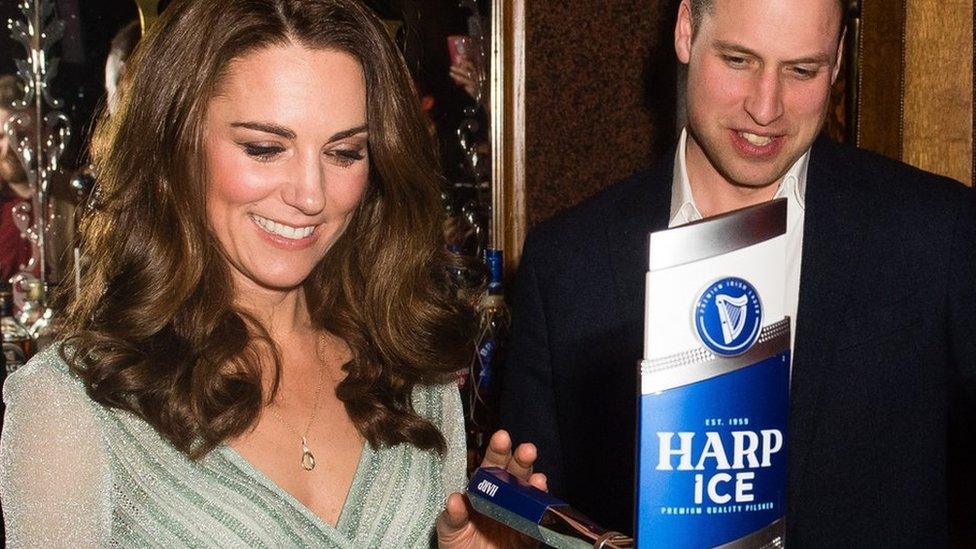 The Duke and Duchess of Cambridge pull a pint as they visit the Belfast Empire Hall in Belfast