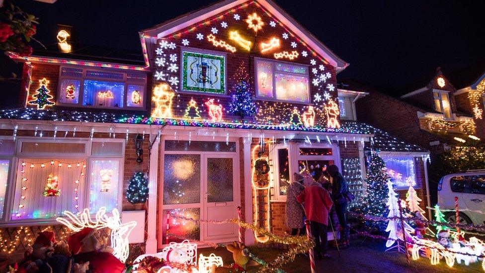 House lit up with Christmas lights