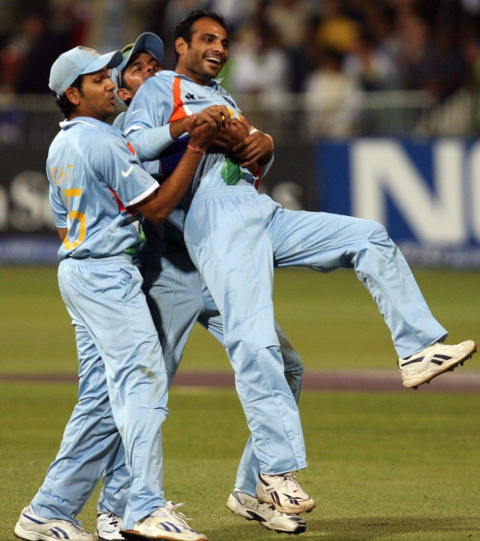 Indian cricket team bowler Joginder Sharma (R) celebrates his wicket of Australia's Brett Lee (not in picture) with teammates in the second semi-final of the ICC World Twenty20 at the Kingsmead Cricket Stadium in Durban, 22 September 2007.