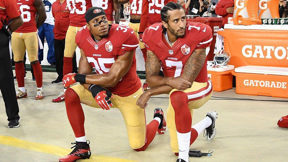 American football players Eric Reid and Colin Kaepernick