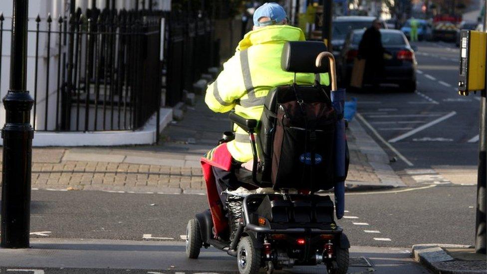 Man using mobility scooter