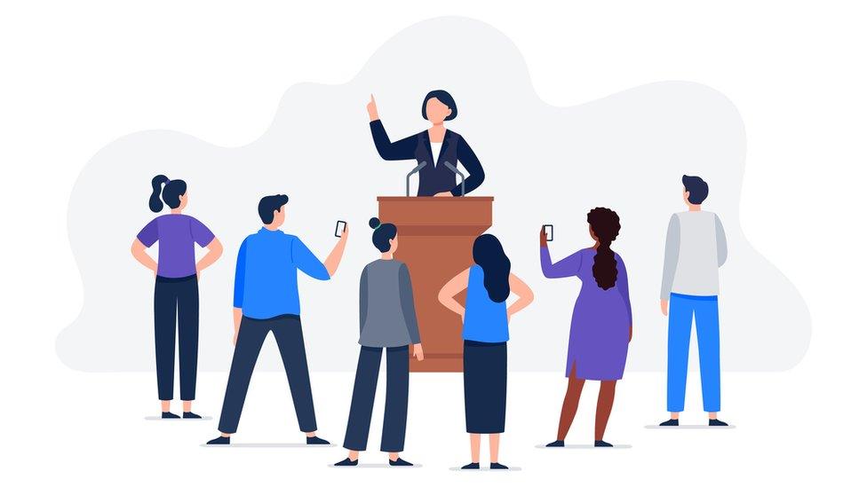 illustration of a candidate at a podium talking to a group of people gathered nearby