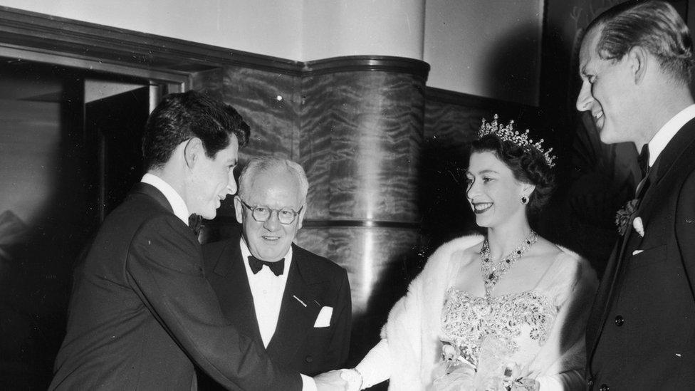 Singer Eddie Fisher meeting the Queen