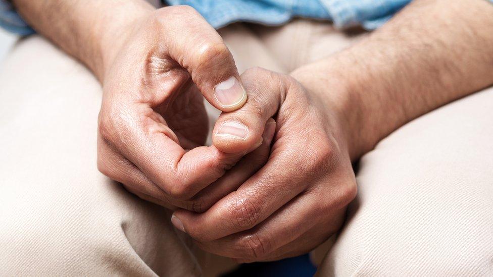 Anonymous image of a man's hands