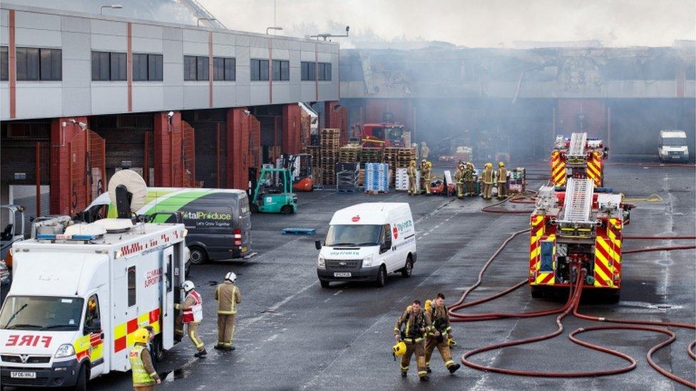 Emergency personnel at market